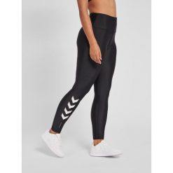 Damskie wysokie legginsy Hummel TE Tola. Czarne legginsy Hummel, bez wzorów, z elastanu. Za 246.00 zł.