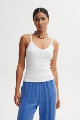 TOP CAMI BIAŁY M - Flawless. Białe topy Flawless, m, bez wzorów, z bawełny, klasyczne, bez kołnierzyka, bez ramiączek. Za 179.00 zł.