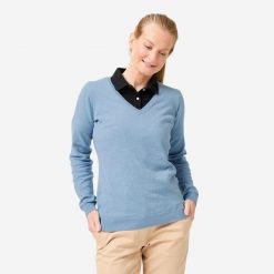Sweter do golfa damski Inesis MW100 dekolt w serek. Niebieskie swetry INESIS, l, bez wzorów, z bawełny, eleganckie, bez ramiączek. Za 69.99 zł.