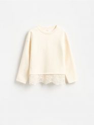 Bluza z ażurowymi wstawkami - złamana biel. Bluzy bez kaptura Reserved, l, w ażurowe wzory, z bawełny, bez kaptura. Za 139.99 zł.