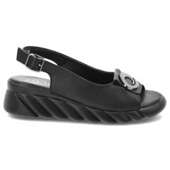 Sandały damskie Filippo, skórzane eleganckie na koturnie z ozdobą ze sprzączką, czarne, DS7011-25-BK. Czarne sandały Filippo, z aplikacjami, ze skóry, eleganckie, bez obcasa, na koturnie, bez zapięcia. Za 129.00 zł.