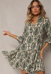 Zielona Sukienka z Bawełny o Rozkloszowanym Kroju Wykończona Falbanką Niloa. Zielone sukienki Renee, na imprezę, l, bez wzorów, z bawełny, eleganckie, bez kołnierzyka, bez ramiączek, mini, rozkloszowane. W wyprzedaży za 43.99 zł.