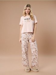 Bawełniana piżama dwuczęściowa z psim motywem - różowy. Czerwone piżamy Sinsay, l, bez wzorów, z bawełny, bez kołnierzyka, bez ramiączek. Za 49.99 zł.