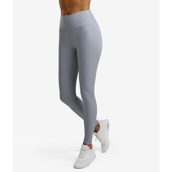 Legginsy sportowe damskie. Niebieskie legginsy NORDICDOTS, bez wzorów, z elastanu, sportowe. Za 365.00 zł.