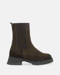 ZIELONE SZTYBLETY Z ZAMSZU 1110248 307 KHAK. Zielone botki Venezia, bez wzorów, ze skóry, bez obcasa, bez zapięcia. Za 269.00 zł.