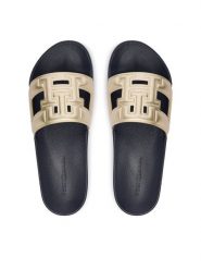 Tommy Hilfiger Klapki Th Pool Slide FW0FW09613 Złoty. Żółte klapki Tommy Hilfiger, bez wzorów, ze skóry, bez obcasa, bez zapięcia. Za 189.99 zł.