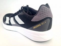 Damskie buty do biegania lekka konstrukcja ADIZERO RC 4 SHOES. Czarne trekkingi adidas, bez wzorów, z gumy, bez zapięcia, do biegania. Za 428.45 zł.