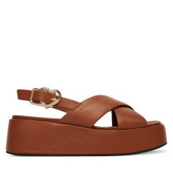 Sandały LOVE MOSCHINO. Brązowe sandały Love Moschino, bez wzorów, bez obcasa, na koturnie, bez zapięcia. Za 919.99 zł.