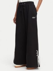 Reebok Spodnie dresowe Dominka RK25696CCW Czarny Regular Fit. Czarne spodnie dresowe Reebok, bez wzorów, z bawełny. Za 279.99 zł.
