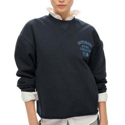 Krótki, obszerny sweter sportowy. Niebieskie swetry Superdry, m, bez wzorów, z bawełny, eleganckie, bez ramiączek. Za 300.25 zł.
