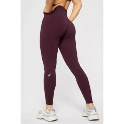 FABLETICS Damskie Legginsy Sportowe Wysoki Stan Seamless Scrunch. Czerwone legginsy sportowe FABLETICS, l, bez wzorów, z materiału, z podwyższonym stanem, na fitness i siłownię. Za 299.99 zł.