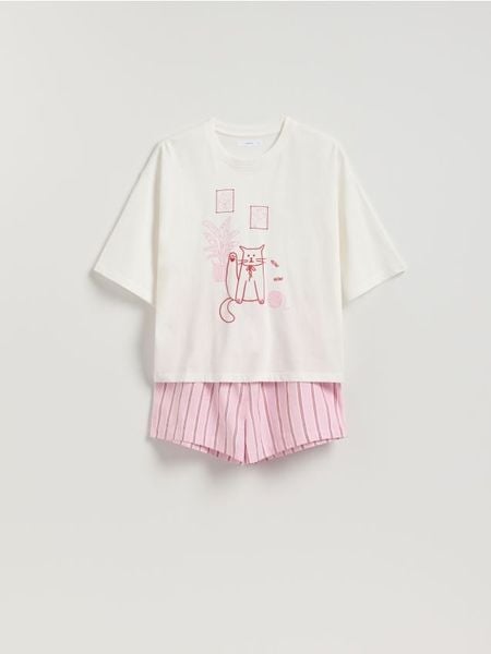 Dwuczęściowa piżama z kotem - różowy. Czerwone piżamy Reserved, l, bez wzorów, z bawełny, bez kołnierzyka, bez ramiączek. Za 99.99 zł.