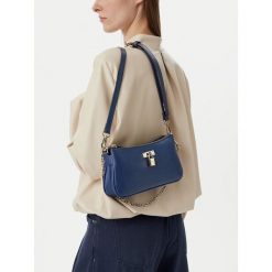 Torebka Nine West. Niebieskie torebki klasyczne Nine West, bez wzorów, klasyczne, bez dodatków. Za 229.99 zł.