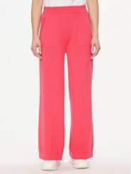 United Colors Of Benetton Spodnie dresowe 1294DF009 Różowy Relaxed Fit. Czerwone spodnie dresowe United Colors Of Benetton, bez wzorów, z bawełny. Za 179.99 zł.