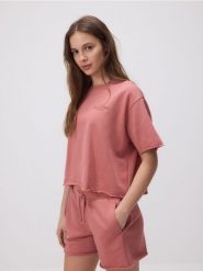 Dresowe szorty - jasnopomarańczowy. Brązowe szorty sportowe Reserved, bez wzorów, z bawełny. Za 59.99 zł.