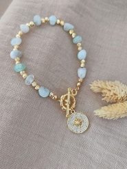 Nakkash Pozłacana bransoletka z kamieniami szlachetnymi rozmiar: onesize. Niebieskie bransoletki Nakkash, z agatem, pozłacane. Za 39.99 zł.