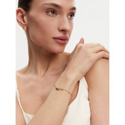Bransoletka Guess. Żółte bransoletki Guess, złote. Za 139.99 zł.