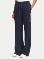 Tommy Hilfiger Spodnie dresowe UW0UW06620 Granatowy Regular Fit. Niebieskie spodnie dresowe Tommy Hilfiger, bez wzorów, z bawełny. Za 289.99 zł.