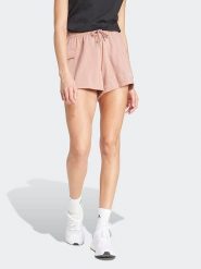 Adidas Szorty dresowe w kolorze jasnoróżowym rozmiar: M. Różowe szorty adidas, bez wzorów, z dresówki. Za 92.21 zł.