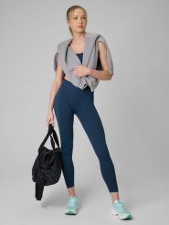 4F Legginsy treningowe bezszwowe damskie - turkusowe XS/S. Niebieskie legginsy 4f, l, bez wzorów, ze skóry, z podwyższonym stanem, na fitness i siłownię. Za 129.99 zł.