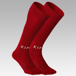 Skarpety piłkarskie Kipsta Essential. Czerwone skarpetki KIPSTA, bez wzorów, z elastanu. Za 14.99 zł.