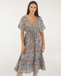 NIEBIESKA SUKIENKA W KWIATY. Niebieskie sukienki Unisono, s, bez wzorów, z bawełny, bez kołnierzyka, bez ramiączek, midi. Za 149.00 zł.