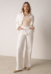 Białe Szerokie Jeansy z Bawełny z Asymetrycznym Zapięciem Saphisia. Białe jeansy Born2be, l, bez wzorów, z bawełny, eleganckie. Za 139.99 zł.