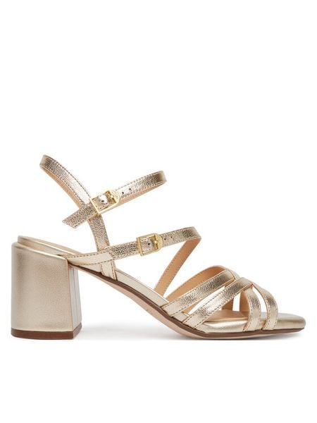 Clarks Sandały Ezoria Strap 26185896 Złoty. Żółte sandały Clarks, bez wzorów, ze skóry, bez obcasa, na słupku, bez zapięcia. Za 350.99 zł.