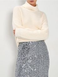 Prążkowany golf - kremowy. Białe swetry Sinsay, l, bez wzorów, prążkowane, bez ramiączek. Za 49.99 zł.