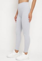 Jasnoniebieskie Legginsy z Wysokim Stanem Parefia. Niebieskie legginsy Born2be, bez wzorów, z jeansu, sportowe. W wyprzedaży za 25.49 zł.