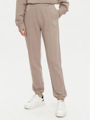 Guess Spodnie dresowe V5RB13 KC3D2 Szary Regular Fit. Szare spodnie dresowe Guess, z aplikacjami, z bawełny. Za 239.99 zł.