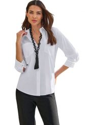 Heine Bluzka w kolorze białym rozmiar: 42. Białe bluzki Heine, bez wzorów, bez kołnierzyka, bez ramiączek. Za 47.94 zł.