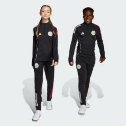 Spodnie treningowe Ajax Amsterdam Tiro 25 Competition. Białe spodnie sportowe adidas, bez wzorów, na fitness i siłownię. Za 259.00 zł.