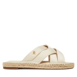 Klapki Tommy Hilfiger. Brązowe klapki Tommy Hilfiger, bez wzorów, bez obcasa, bez zapięcia. Za 199.99 zł.