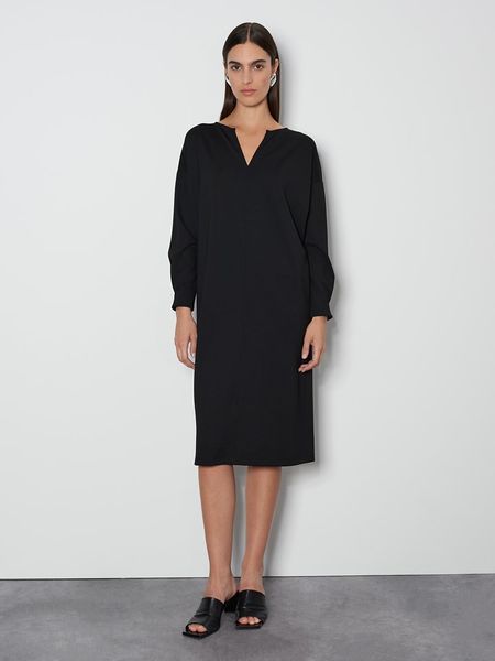 Someday Sukienka w kolorze czarnym rozmiar: 38. Czarne sukienki someday., na co dzień, bez wzorów, bez kołnierzyka, bez ramiączek, midi, proste. Za 166.49 zł.