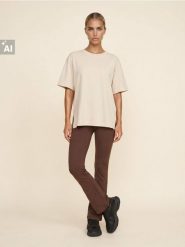 Bawełniana koszulka z krótkim rękawem z rozcięciami Everyday Active - kremowy. Białe t-shirty sportowe Sinsay, l, bez wzorów, z bawełny, bez ramiączek, na fitness i siłownię. Za 19.99 zł.