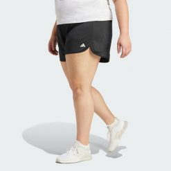 Szorty Pacer Essentials Knit High-Rise (Plus Size). Czarne szorty sportowe adidas, bez wzorów, z materiału, na fitness i siłownię. Za 139.00 zł.