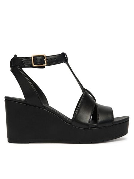 Clarks Sandały Sabina Hope 26186102 Czarny. Czarne sandały Clarks, bez wzorów, ze skóry, bez obcasa, na koturnie, bez zapięcia. Za 422.99 zł.