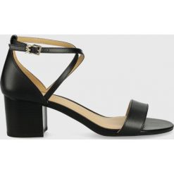 MICHAEL Michael Kors sandały skórzane SERENA FLEX SANDAL 40S2SEMA1L.001 kolor czarny. Czarne sandały MICHAEL Michael Kors, bez wzorów, z materiału, bez obcasa, na obcasie, bez zapięcia. W wyprzedaży za 619.99 zł.