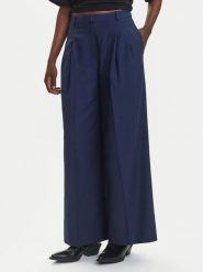 HUGO Spodnie materiałowe Harenau 50542606 Granatowy Relaxed Fit. Niebieskie spodnie materiałowe Hugo, bez wzorów, z bawełny. Za 849.99 zł.