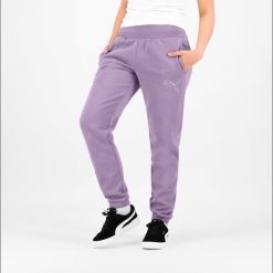 Spodnie dresowe damskie Puma Gym & Pilates. Niebieskie spodnie dresowe Puma, bez wzorów, z bawełny. W wyprzedaży za 89.99 zł.