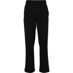 Spodnie damskie Athlecia Jacey. Czarne spodnie dresowe Athlecia, bez wzorów, z dresówki. Za 232.00 zł.