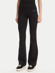 Guess Spodnie dresowe V5RB15 KCD02 Czarny Regular Fit. Czarne spodnie dresowe Guess, z aplikacjami, z dresówki. Za 295.00 zł.