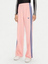 Adidas Spodnie dresowe adicolor Classic Firebird JP2312 Różowy Loose Fit. Czerwone spodnie dresowe adidas, bez wzorów, z dresówki. Za 219.99 zł.