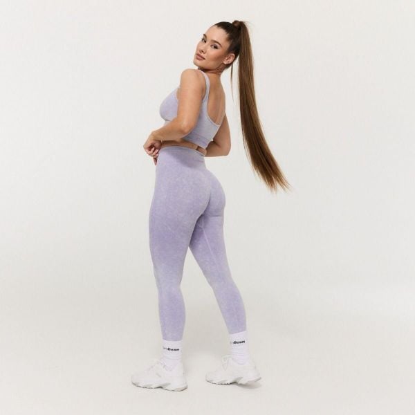 Legginsy GymBeam Lift. Fioletowe legginsy GYMBEAM, bez wzorów, z materiału. Za 94.99 zł.