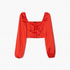 Czerwona gorsetowa bluzka - Czerwony. Czerwone bluzki Cropp, m, bez wzorów, z tkaniny, bez kołnierzyka, bez ramiączek. Za 89.99 zł.