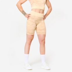 Spodenki fitness damskie Domyos. Niebieskie szorty sportowe DOMYOS, bez wzorów, z materiału, z podwyższonym stanem, na fitness i siłownię. Za 59.99 zł.
