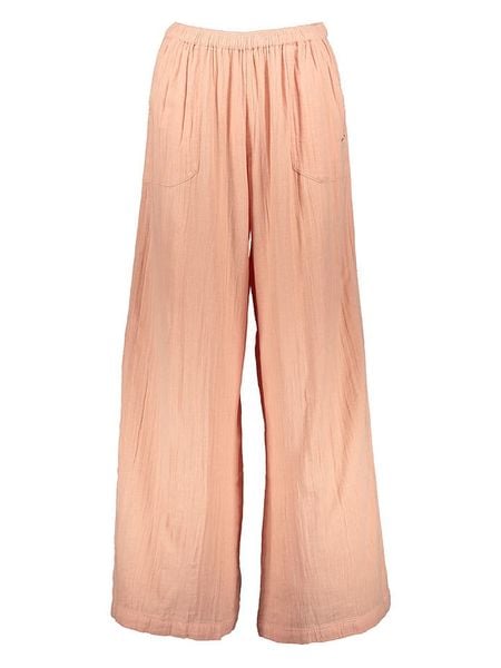 Roxy Spodnie w kolorze pomarańczowym rozmiar: M. Pomarańczowe spodnie materiałowe Roxy, bez wzorów, z materiału. Za 122.38 zł.