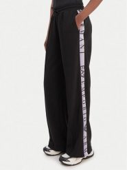 EA7 Emporio Armani Spodnie dresowe 7W001155 AF12501 UC001 Czarny Relaxed Fit. Czarne spodnie dresowe EA7 Emporio Armani, bez wzorów, z dresówki. Za 529.99 zł.