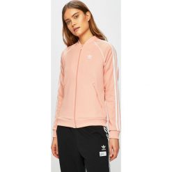 Adidas Originals - Bluza. Pomarańczowe bluzy adidas Originals, z aplikacjami, z bawełny, bez kaptura. W wyprzedaży za 249.90 zł.